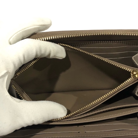 Authentic Louis Vuitton Coussin Monogram Embossed Lambskin Leather Zippy Wallet - Picture 14 of 16
